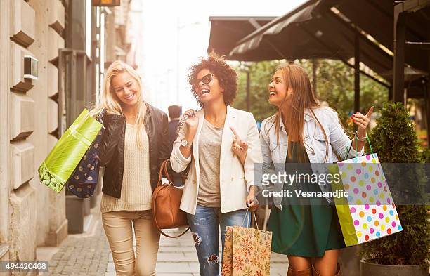 happy woman in shopping - retail stock pictures, royalty-free photos & images