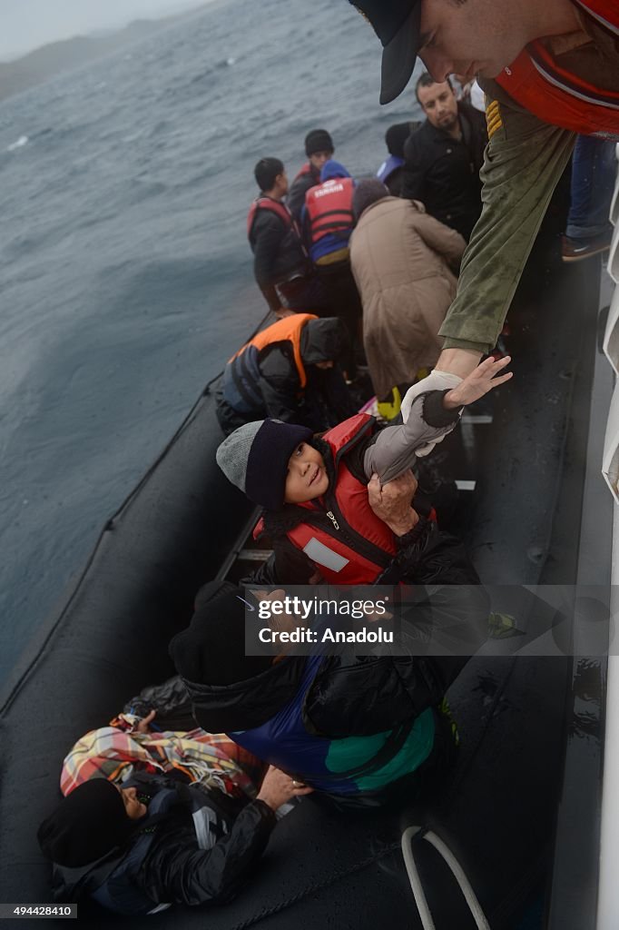 Coast guards rescue refugees off Turkish shores