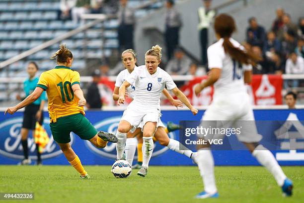 Isobel Christiansen of England and Emily van Egmond of Australia compete for the ball in the match between England and Australia during the 2015...