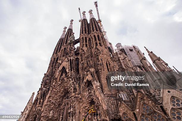 Employees work on the Birth's Facade of 'La Sagrada Familia' on October 26, 2015 in Barcelona, Spain. 'La Sagrada Familia' Foundation announced on...