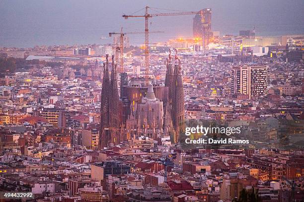 La Sagrada Familia' stands over residential buildings on October 26, 2015 in Barcelona, Spain. 'La Sagrada Familia' Foundation announced on October...