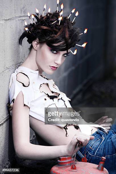 fashion model with lit matches in hair - matchstick stock pictures, royalty-free photos & images