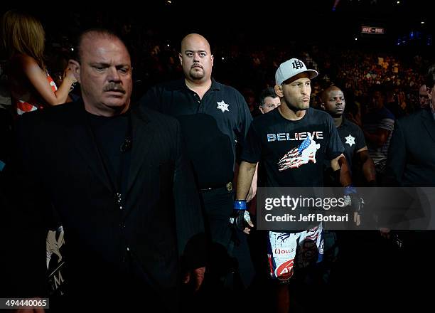 Dan Henderson walks to the Octagon before facing Daniel Cormier in their light heavyweight bout during the UFC 173 event at the MGM Grand Garden...