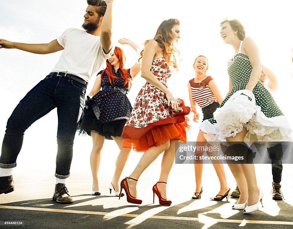 Group of friends dancing.