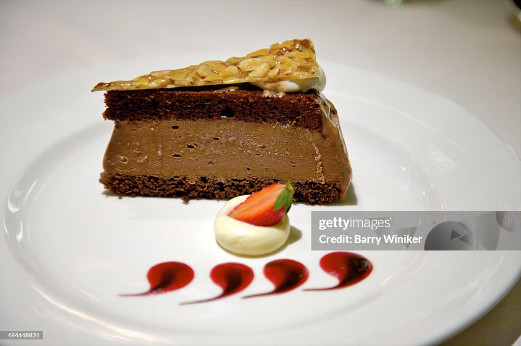 Slice of chocolate torte on plate