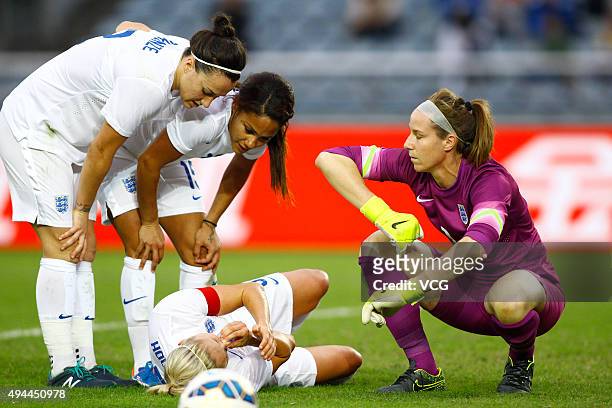 Stephanie Houghton of England goes down during the match between England and Australia during the 2015 Yongchuan Women's Football International...