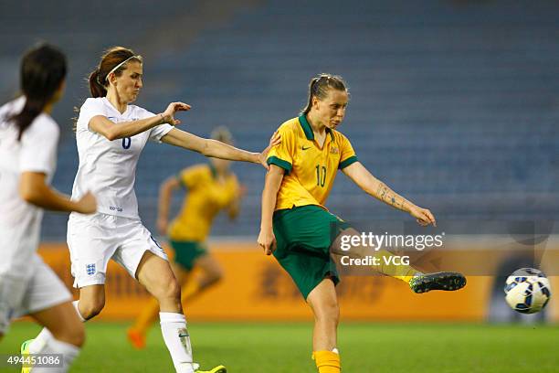 Jill Scott of England and Emily van Egmond of Australia compete for the ball in the match between England and Australia during the 2015 Yongchuan...