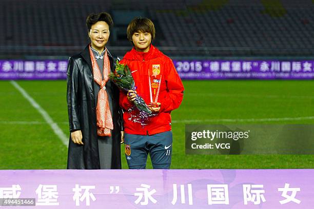 Wang Shuang of China wins the Best Goal Shooter after the 2015 Yongchuan Women's Football International Matches at Yongchuan Sports Center on October...