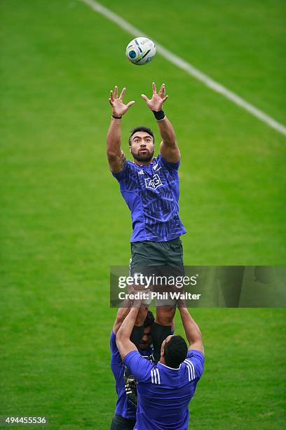 Victor Vito of the All Blacks leaps in the lineout during a New Zealand All Blacks training session at Pennyhill Park on October 27, 2015 in Bagshot,...