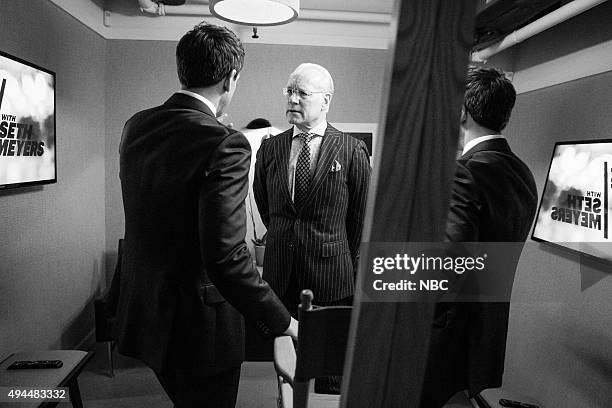 Episode 277 -- Pictured: Host Seth Meyers talks with Project Runways Tim Gunn backstage on October 26, 2015 --