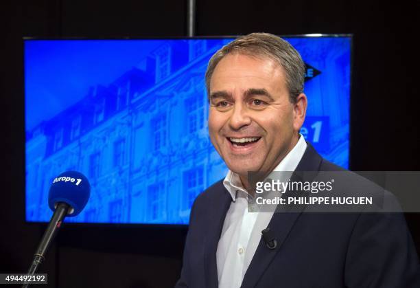 French right-wing The Republicans party candidate for the regional elections in the Nord-Pas-de-Calais-Picardie region Xavier Bertrand poses before a...