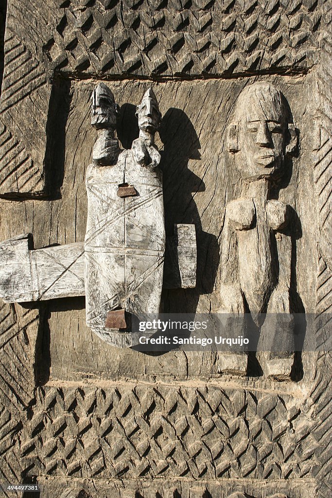 Decorated Dogon wooden door with lock