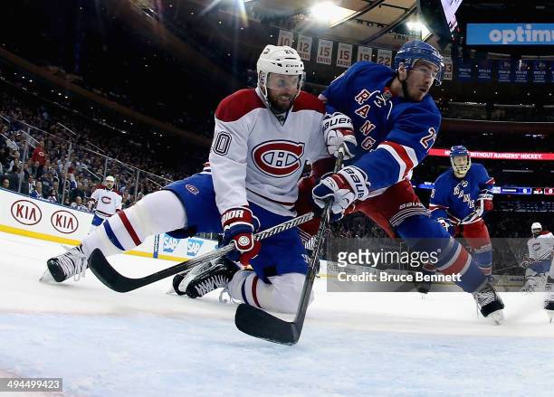 Thomas Vanek of the Montreal Canadiens and Ryan McDonagh of the New York Rangers battle for position during Game Six of the Eastern Conference Final...