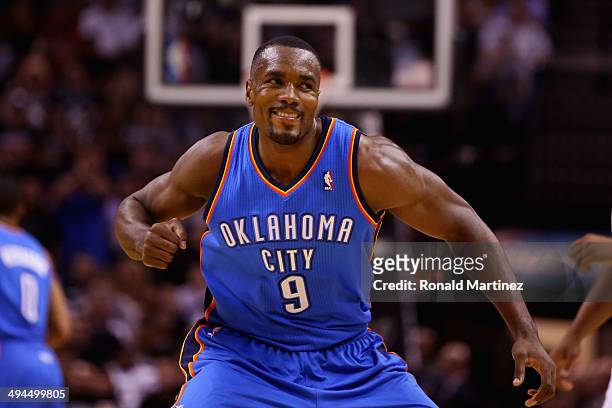 Serge Ibaka of the Oklahoma City Thunder reacts after a play in the first quarter against the San Antonio Spurs during Game Five of the Western...