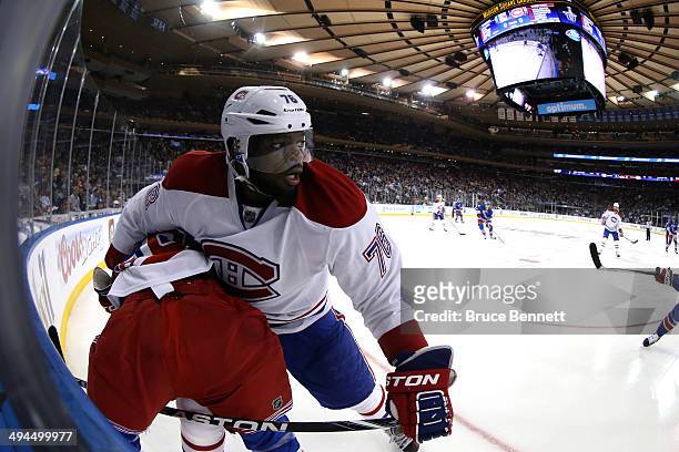 Subban of the Montreal Canadiens gets tangled up with Martin St. Louis of the New York Rangers along the boards during Game Six of the Eastern...