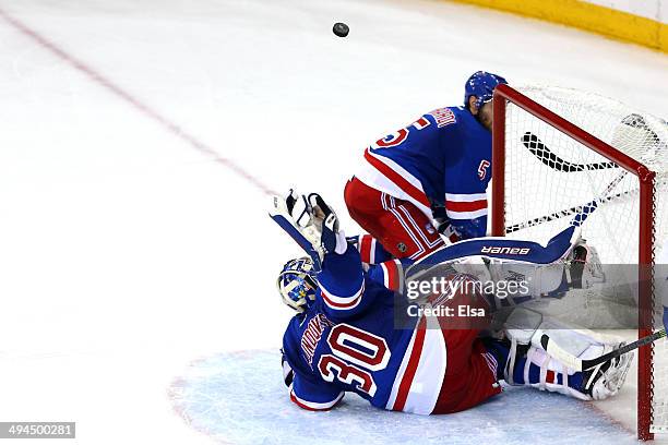 Henrik Lundqvist of the New York Rangers makes a save against the Montreal Canadiens during Game Six of the Eastern Conference Final in the 2014 NHL...