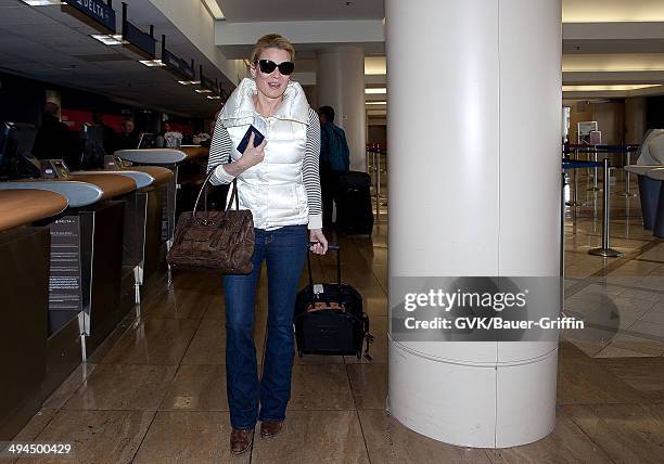 Laurie Holden is seen at Los Angeles International Airport on February 06, 2013 in Los Angeles, California.