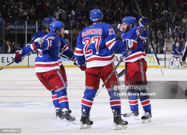 Dominic Moore of the New York Rangers celebrates his second period goal at 18:07 against the Montreal Canadiens during Game Six of the Eastern...