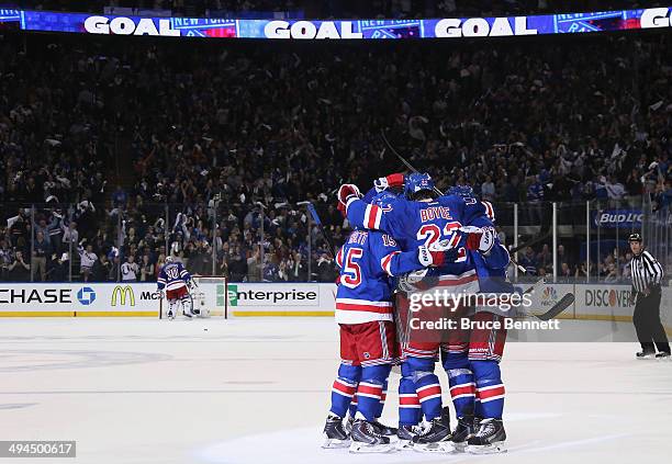 Dominic Moore of the New York Rangers celebrates his second period goal at 18:07 against the Montreal Canadiens during Game Six of the Eastern...