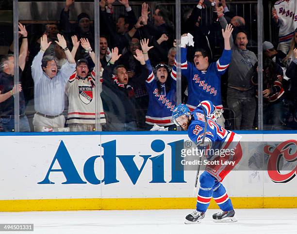 Dominic Moore of the New York Rangers celebrates scoring a goal in the second period of Game Six of the Eastern Conference Final against the Montreal...