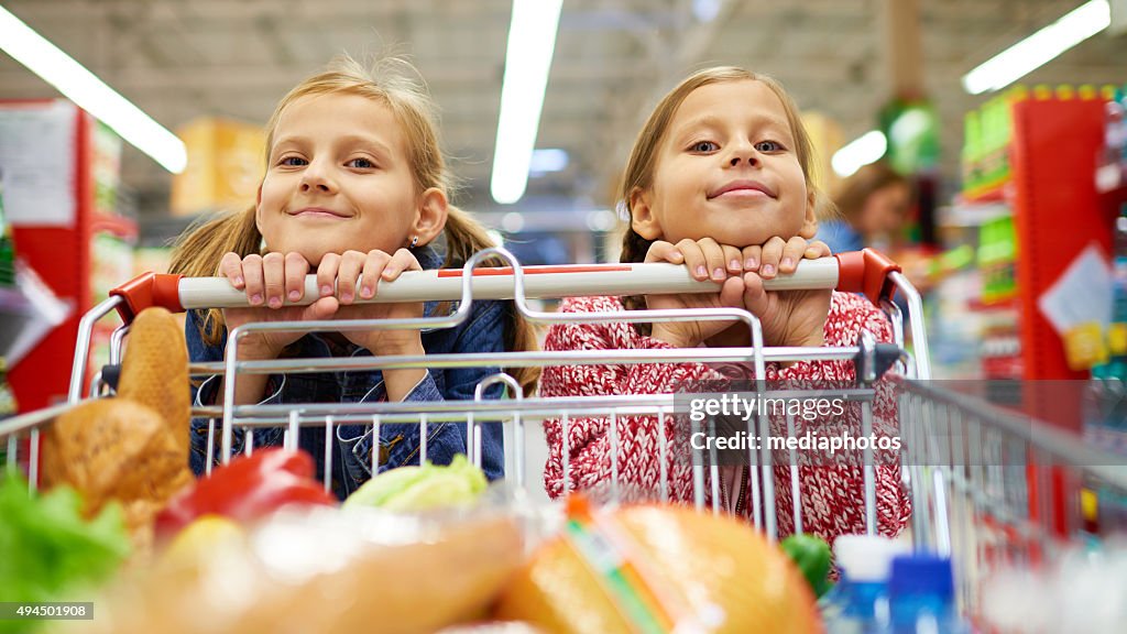 Little sisters doing shopping