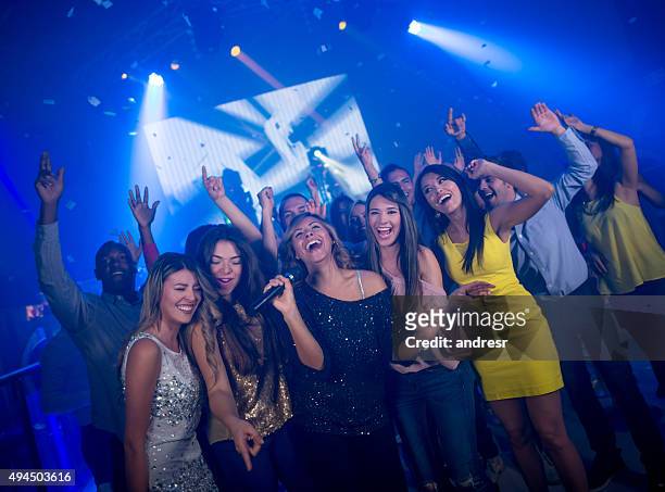 girl's night out - karaoke stock pictures, royalty-free photos & images
