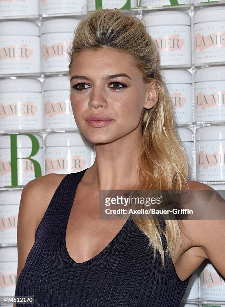 Model Kelly Rohrbach arrives at the La Mer Celebrates 50 Years Of An Icon at Siren Studios on October 13, 2015 in Hollywood, California.