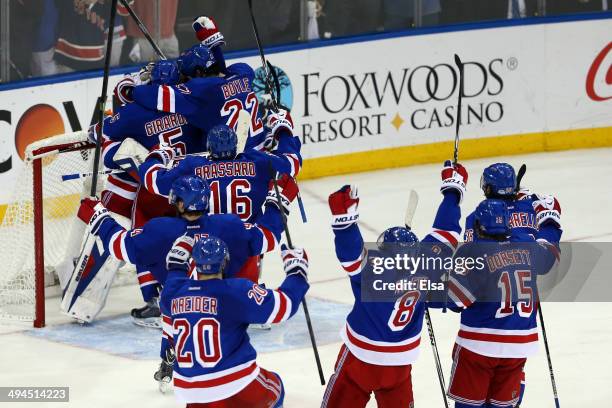 The New York Rangers celebrates after defeating the Montreal Canadiens in Game Six to win the Eastern Conference Final in the 2014 NHL Stanley Cup...