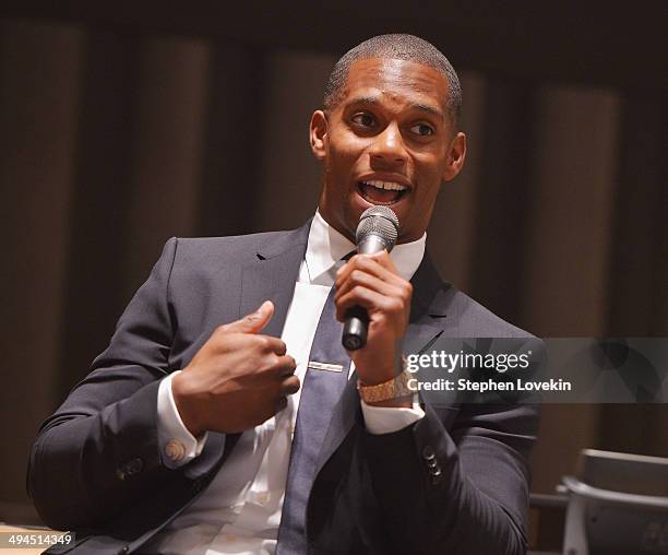 Football player Victor Cruz speaks to attendees at The 2014 Social Innovation Summit Presented by Landmark Ventures at United Nations on May 29, 2014...