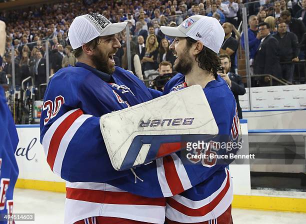 Henrik Lundqvist and Mats Zuccarello of the New York Rangers celebrates after defeating the Montreal Canadiens in Game Six to win the Eastern...