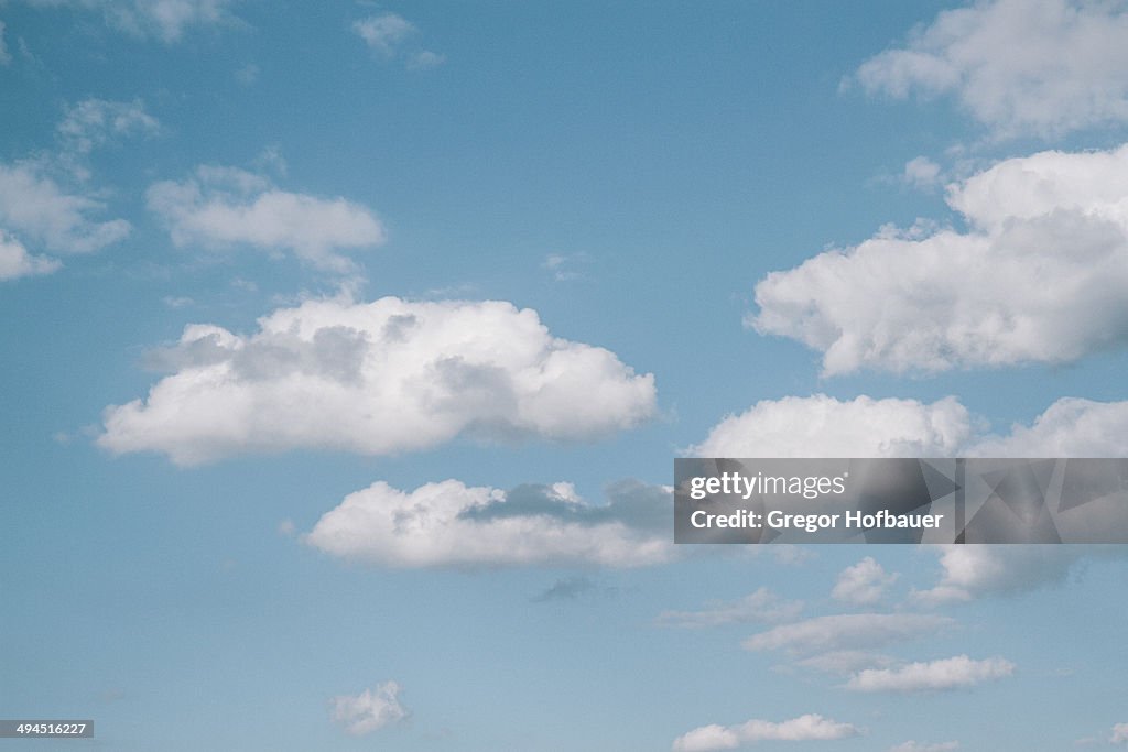 Puffy Clouds in a Blue Sky