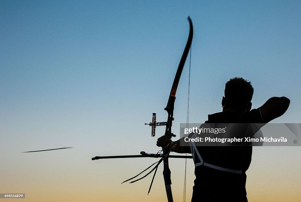 Archer fires an arrow