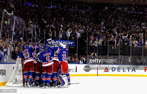 The New York Rangers celebrates after defeating the Montreal Canadiens in Game Six to win the Eastern Conference Final in the 2014 NHL Stanley Cup...