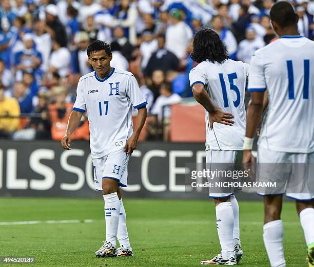 Midfielder Andy Najar of Honduras reacts with teammates Roger Espinoza and Jerry Bengtson during a World Cup preparation friendly match against...