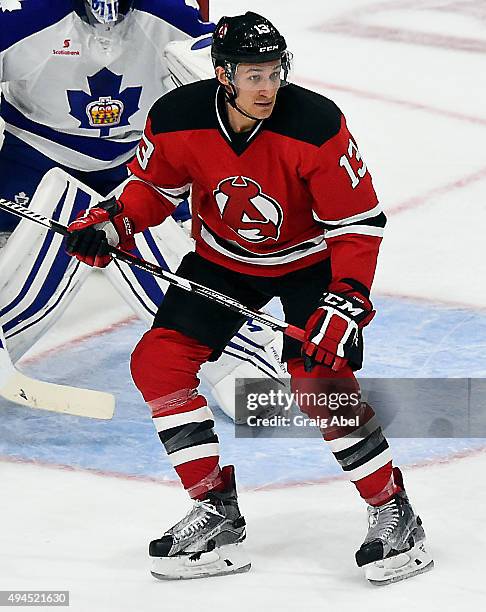 Jim O'Brien of the Albany Devils looks for a rebound against the Toronto Marlies during game action on October 17, 2015 at the Ricoh Coliseum in...