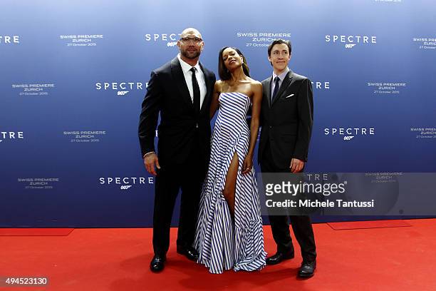Actor Dave Bautista , L, Actress Naomie Harris and Gregg Wilson, Associate Producer, EON, arrive on the red carpet during the swiss premiere of 007,...