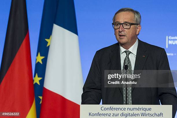 European Commission President Jean-Claude Juncker delivers a speech during the France-Germany digital conference at the Elysee palace on October 27,...