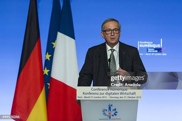 European Commission President Jean-Claude Juncker delivers a speech during the France-Germany digital conference at the Elysee palace on October 27,...