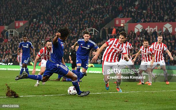 Loic Remy of Chelsea scores an injury time goal to level the scores at 1-1 during the Capital One Cup fourth round match between Stoke City and...