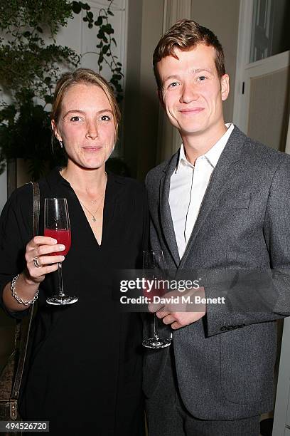 Ed Speleers and Asia Macey attend the COS Dinner At Spring at Spring at Somerset House on October 27, 2015 in London, England.