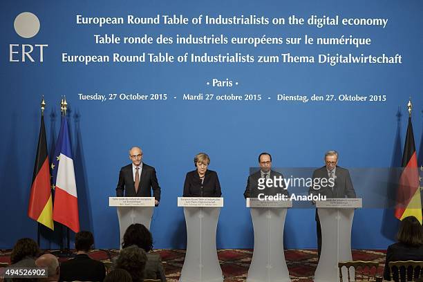 Of Air Liquide, Benoit Potier, German Chancellor Angela Merkel, French President Francois Hollande and European Commission President Jean-Claude...