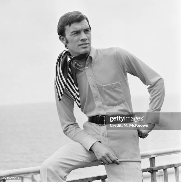 Model wearing a belted cotton lisle shirt and neckerchief, UK, 23rd September 1969.