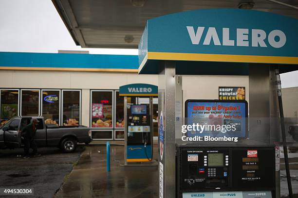 Fuel pumps stand outside a Valero Energy Corp. Gas station in Shelbyville, Kentucky, U.S., on Tuesday, Oct. 27, 2015. Valero is scheduled to release...