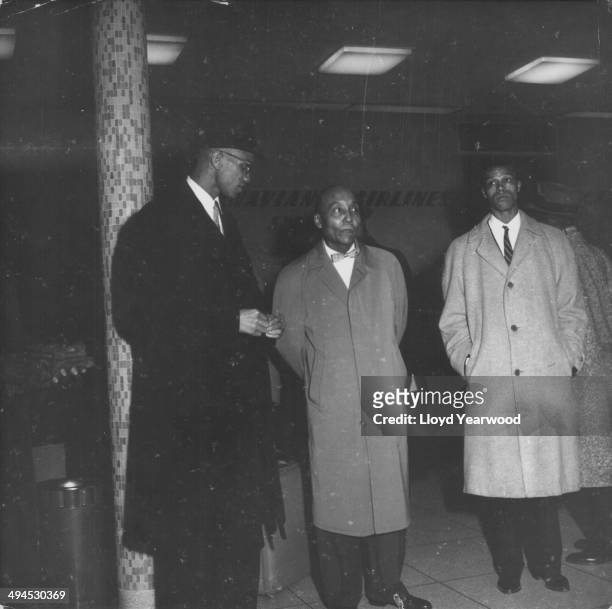 Human rights activist Malcolm X, with political leaders Elijah Muhammad and Louis Farrakhan, circa 1950-1965.