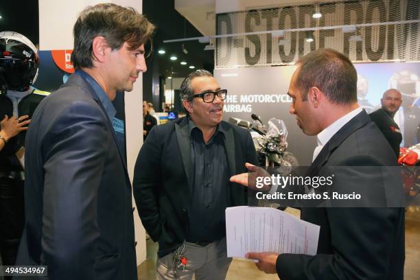 Beppe Convertini, Guillermo Mariotto and Cristiano De Masi attend the 'Diobo' Che Bello' charity event at D-Store Dainese on May 29, 2014 in Rome,...