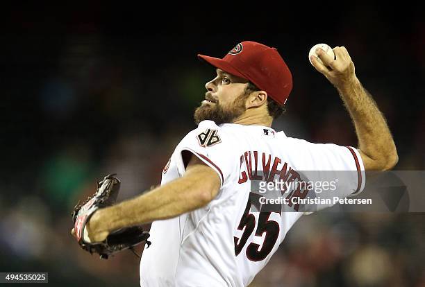 Starting pitcher Josh Collmenter of the Arizona Diamondbacks pitches against the Cincinnati Reds during the MLB game at Chase Field on May 29, 2014...