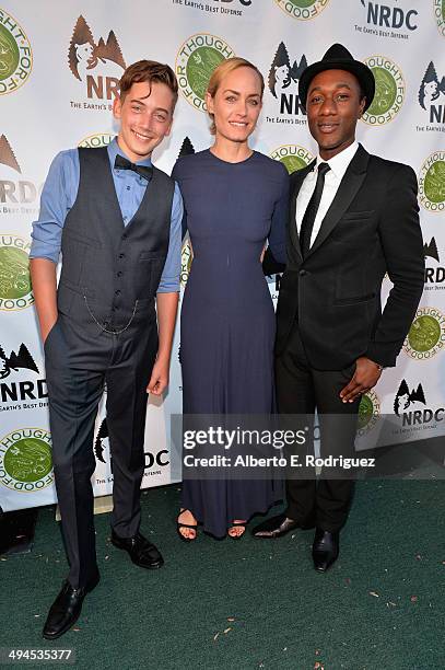 Auden McCaw actress Amber Valletta and recording artist Aloe Blacc attend NDRC Food For Thought Benefit celebrating safe and sustainable eating on...