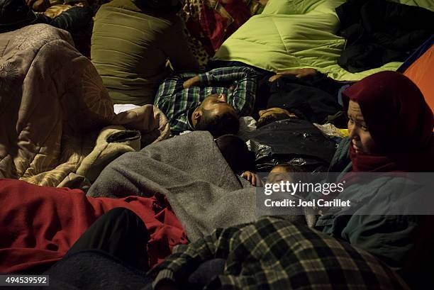 afghan migrants waiting for ferry in lesvos, greece - lesvos stock pictures, royalty-free photos & images
