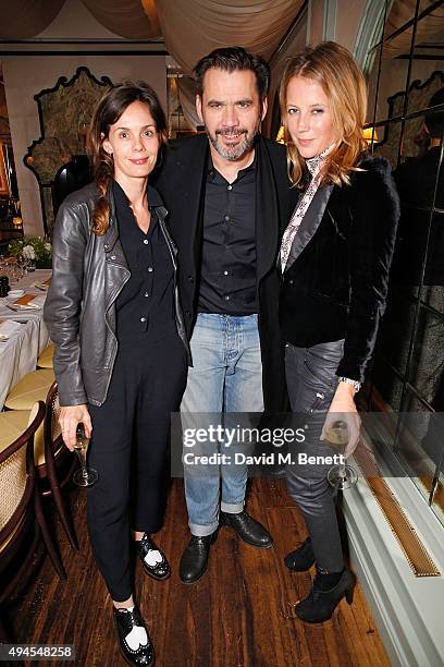 Guest, Roland Mouret and Tilly Wood attend the drinks and dinner at Daphne's to celebrate the Robert Clergerie Walton Street store launch hosted by...