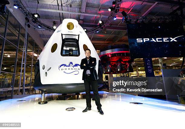 SpaceX CEO Elon Musk unveils the company's new manned spacecraft, The Dragon V2, designed to carry astronauts into space during a news conference on...